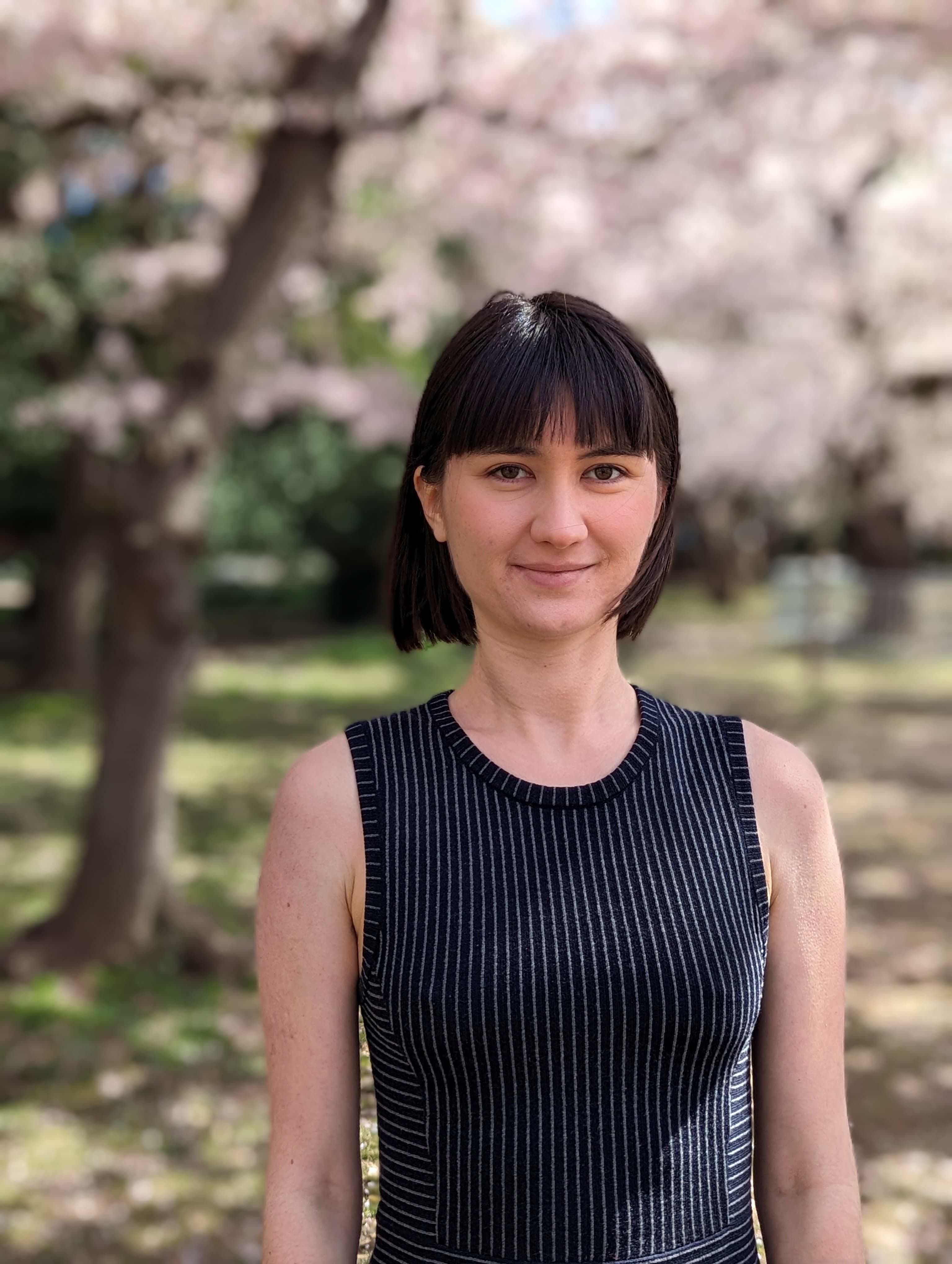Portrait image with sakura in background